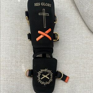 Aria Absolutely Ridiculous leg guard black bible binding